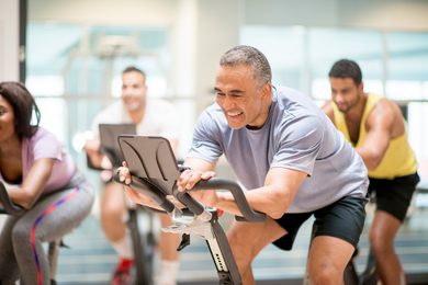 People on fitness bikes