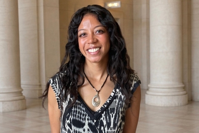 Portrait photo of Krystal Montgomery in front of some columns