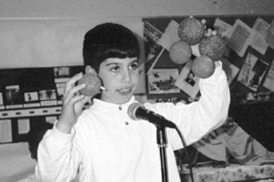 Carlos Kaufman explains plasma fusion to his third-grade class.