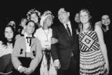 Isao Okawa, who donated $27 million to establish a new Center for Future Children at the Media Lab (see story on page 8), visits with Junior Summit delegates dressed in native costumes on the last night of the week-long event.