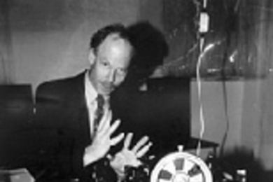Professor Keith Nelson with the laser equipment he uses at the Plasma Fusion and Science Center to analyze thin films used in microelectronics components.