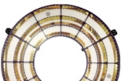 The high-energy transmission grating (HETG) consists of 336 gold grating facets mounted on an assembly that can be swung into position behind the Chandra mirrors. The inner two rings are high-energy grating facets, and the outer two rings are medium-energy grating facets.