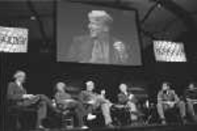 TR 100 panelists for the "Innovation Conversation" symposium were (left to right) President Charles Vest, Marleen McDaniel of Women.com Networks, Robert Metcalfe of International Data Group, broadcast journalist Bill Moyers, Jeff Taylor of Monster.com, and Mark Cuban of Broadcast.com.