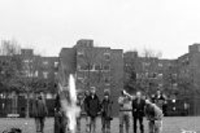 In another Freshman Advising Seminar, "Building a Rocket-Deployed Rover," Dr. James Bales of electrical engineering and computer science videotapes a stduent rocket splititng in two upon takeoff during launch at Briggs Field.