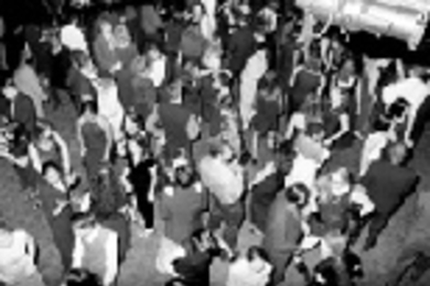 At Saturday's Millennium Ball in the Student Center, students dance to techno rhythms beneath the lights in La Sala de Puerto Rico.