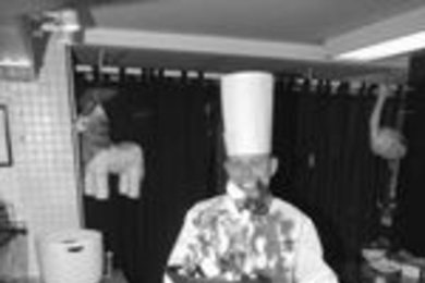 Aramark Executive Chef Peter Dumke, formerly of the Four Seasons, does an airborne stir-fry at his new job at MIT.