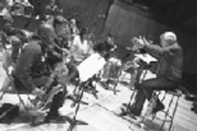 Herb Pomeroy leads a Festival Jazz Ensemble rehearsal on April 13 for the group's concert later this month.