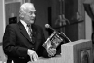 Apollo 11 astronaut Buzz Aldrin at his MIT appearance on June 16. In the left foreground are models of his reusable Star Booster launch vehicle.