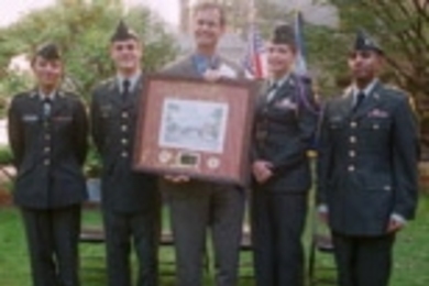 The Paul Revere Battalion won the Most Outstanding ROTC Unit Award, presented in a ceremony last week. Showing the award are several cadets and their trainer. Left to right: Michaele Mandulak of Wellesley; Jared Levant of Tufts; LtC. (Ret.) Robert R. Rooney, who received a gift of thanks from the cadets; Danielle Boudreau of Harvard; and Ishwar Sivakumar, a senior in electrical engineering and com...