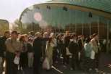 Dean of Architecture William Mitchell (center, gesturing) gave a campus tour to visiting parents, grandparents and siblings during Family Weekend, Friday-Sunday, Oct. 20-22.