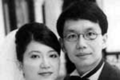 Jennifer Loo and Kah Kay Sung on their wedding day. Both were killed when their Singapore Airlines flight crashed during take-off last week.