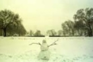 This snowman, one of several snow figures to appear in the wake of this week's tardy nor'easter, seems to be asking what all the fuss was about.