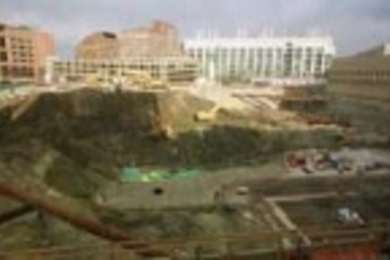 A view of the Stata Center construction site from a window of Building 36 shows a gaping hole.