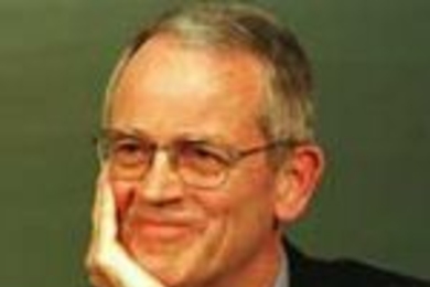 President Charles M. Vest, shown here at last week's press conference, was pleased at the reaction to MIT's OpenCourseWare initiative.