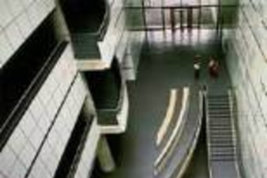 Lobby, Wiesner Building
Architect: I.M. Pei
Balustrades and seating: Scott Burton
Steel and concrete, 1985
Wall mural: Kenneth Noland
Here-There, 1985
Colored painted inserts in wall