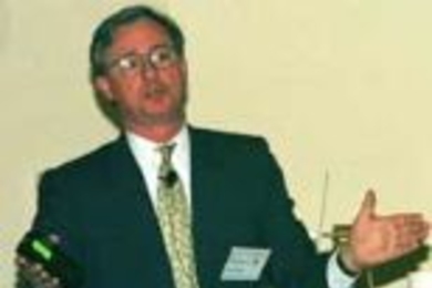 Professor Michael Golay speaks at a symposium on nuclear energy.