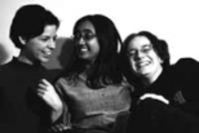 One of the photos from the "Members of the Community: LBGTS (Lesbian, Bisexual, Gay, Transgendered and Supporters) at MIT" exhibit in the Infinite Corridor. Left to right: Jessica Hinel, a sophomore in music and theater arts; and Anindita Basu and danah boyd, both graduate students in media arts and sciences.