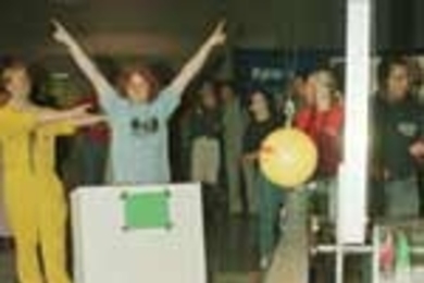 Sophomore Lael Odhner signals victory in the first round of "Tiltillator."