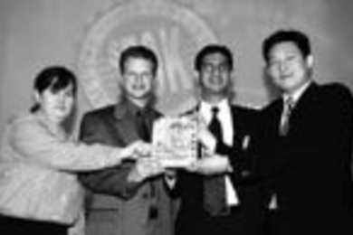 The Angstrom Medica team won the $50K competition. Left to right: Anne Shehab, Darren Obrigkeit, Sudhir Borgonha and Edward Ahn.