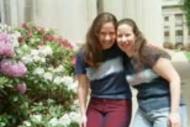 Graduating twins Susan (left) and Sophia Yuditskaya.