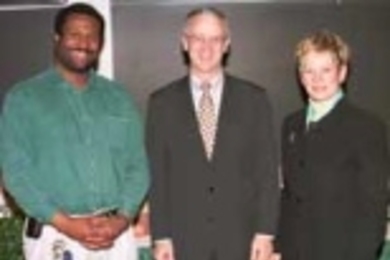Murphy Award winners Derrick Barnes (left) and Gail Hickey stand with President Charles Vest.