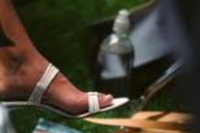 High-heeled shoes and newspapers were among the frequently spotted audience accessories at Commencement.