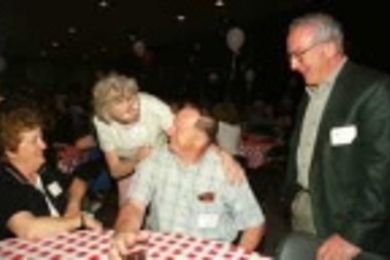 Enjoying the Quarter Century Club summer picnic held at the Johnson Athletic Center on June 12 are (left to right) Lea Milne, Maureen Aversa, John Milne and Joseph Aversa, all from Lincoln Laboratory.