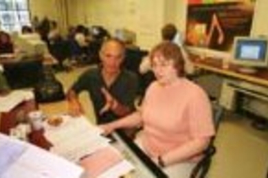 Hal Scheintaub, a teacher at Governor Dummer Academy in Byfield, Mass., and Milton High School teacher Mary Letourneau use a program called StarLogo developed at the Media Lab to help high school science teachers develop computer simulations for their classrooms. They were at a workshop held at MIT earlier this month.