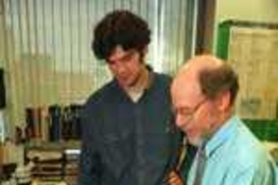 Graduate student Peter Reddien (left) and Professor Bob Horvitz of biology made a discovery about programmed cell death in C. elegans roundworms.