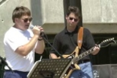 Robert Cunkelman (left) and David Silverman of Facilities performed with the rock band O-Zone on the Stratton Student Center steps.
