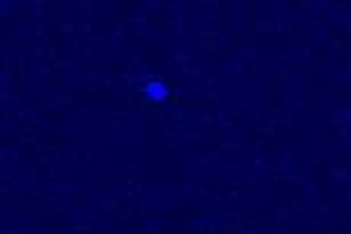 A Chandra image of neutron star KS 1731-260, remarkably cool after 12 years of being bombarded with hot gas from a companion star, not visible here. The now dim KS 1731-260 is the light blue object slightly above the midline of this image.