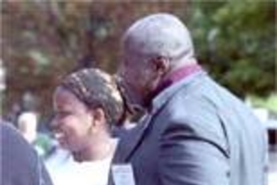 Kezia Charles (left), a sophomore in mathematics, showed her father Carlos (right) and sister Adisa around campus during Family Weekend. The two were visiting from Trinidad.