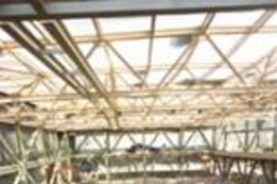 The Zesiger Sports and Fitness Center's new indoor swimming pool (left) and windows reflecting the back of the Stratton Student Center (right).