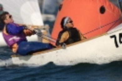 Mike Kalin and Ariya Dararutana sail the "Susan B" during the Interclub Dinghy Frostbite Nationals on Duxbury Bay.