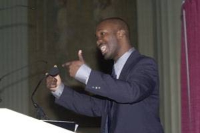 Graduate student Eric Caulfield nearly brought down the house with his impassioned and alliterative talk on "The Illusion of Full Inclusion."