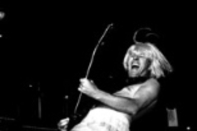 A detail from "Captain Sensible, Boston, October 2001" by John        Nikolai. Nikolai's photos of punk rock stars and local intellectuals        are being shown at the Weisner Student Art Gallery.