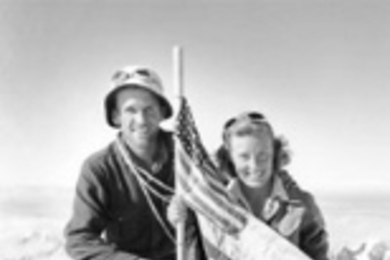 Brad and Barbara Washburn kneel at the summit of Mount Bertha  in Alaska in July 1940. The world-renowned explorers will speak at MIT on April  5.