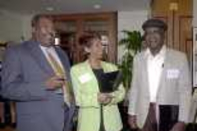 Quarter Century inductees (left to right) Timothy R. Downes, Paulette P.        Mosley and Bertram M. Clement, chat at a recent lunch.