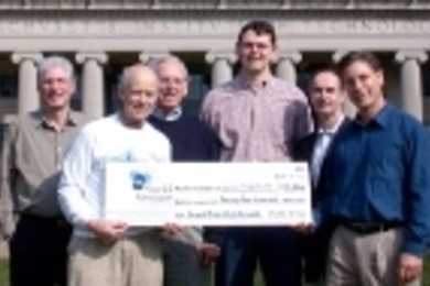 Members of Wilson TurboPower Inc. collect the $25,000 grand prize from the Social Ventures business plan competition. Pictured (left to right) are: Richard McRay (S.B. 1961, S.M.), Professor Emeritus David Gordon Wilson of mechanical engineering, John Wasserlein (S.B. 1963), graduate student in management Joern Kallmeyer, friend of the team Fredric Young (S.M. 1960) and Bruce Anderson (S.B. 1970, ...
