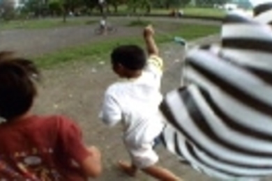 This still is taken from Sebastian Diaz Morales' DVD projection, "15,000,000 Parachutes" (2001), part of the List Center's current exhibition.