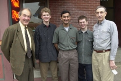 Hartley Rogers (far left) and his co-coach Richard P. Stanley (far right), celebrate with the team that came in second place in the Putnam math competition: (left to right) Reid W. Barton, Abhinav Kumar and Pavlo M. Pylyavskyy.