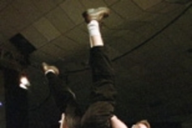 Professor Alexander Slocum hoists and carries 2.007 contest winner Martin Jonikas on a victory lap around Johnson Athletic Center.