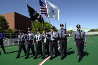 The new MIT Campus Police drill team practices for its appearance at Commencement.  Left to right: Patrol officers Duane Keegan,Willard Boulter, Bennett Chin, William Smith, Kevin O'Connor, Jamie DiGregorio and Lt. Daniel Costa (Officer Orlando Tirella is absent).