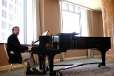 Hawley at the piano prior to the 2000 Van Cliburn amateur competition