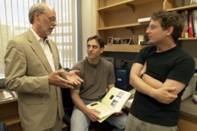 Professor Phillip Sharp (left), Assistant Professor Christopher Burge (center) and Center for Cancer Research postdoctoral associate William Fairbrother discuss their computational method for predicting which sequences of genetic material get spliced out. This work was the result of a collaboration between Burge's laboratory in the Department of Biology and that of Sharp, director of the McGovern ...