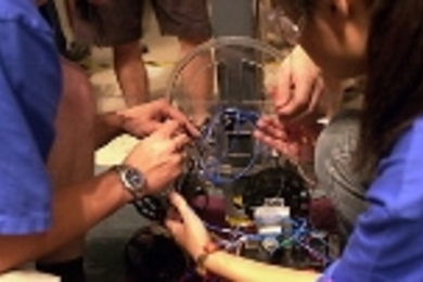 As the moment of competition approaches, last-minute tweaking can be critical at the International Design Competition held at MIT on Aug. 16.