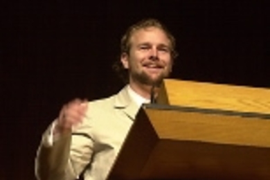 Undergraduate Association President Josiah Seale speaks at convocation.