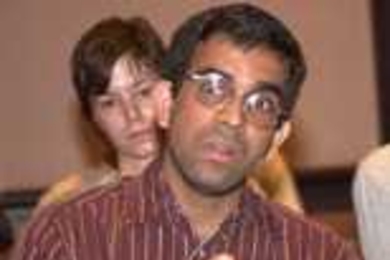 At the Monday panel, "MIT's Responsibility in a Dangerous World," STS graduate student Kaushik Sunder Rajan suggests that to be truly welcoming and truly American, commemorative events should include not just Old Glory but the flags of every country of victims of the Sept. 11 terrorist attacks.