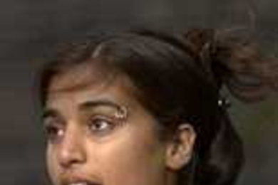 Senior Jyoti Agarwal (above) addresses the gathering at Kresge Oval Wednesday.