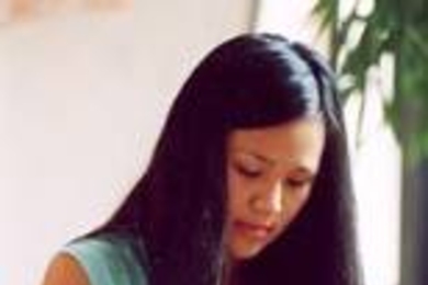 Freshman Christina Huang crafts clay sculpture of the Twin Towers.